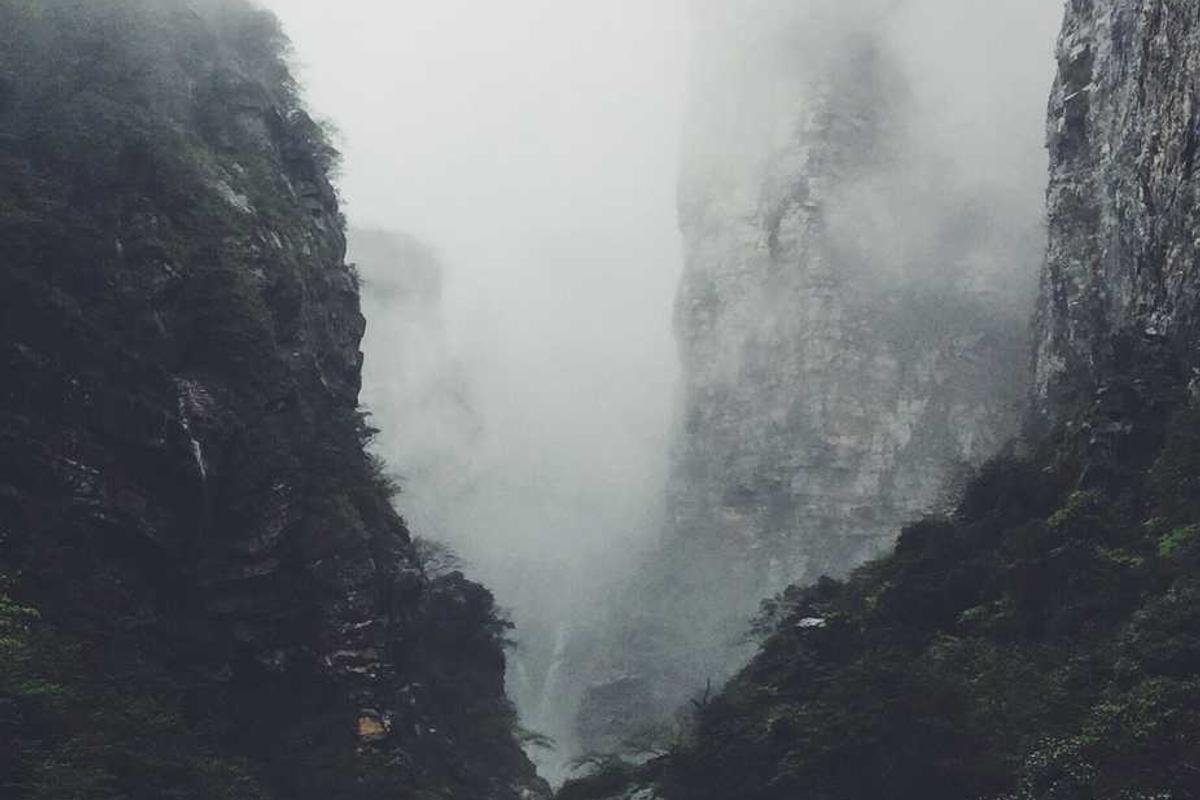 Person using laptop at ergonomic desk setup in home office Chennai