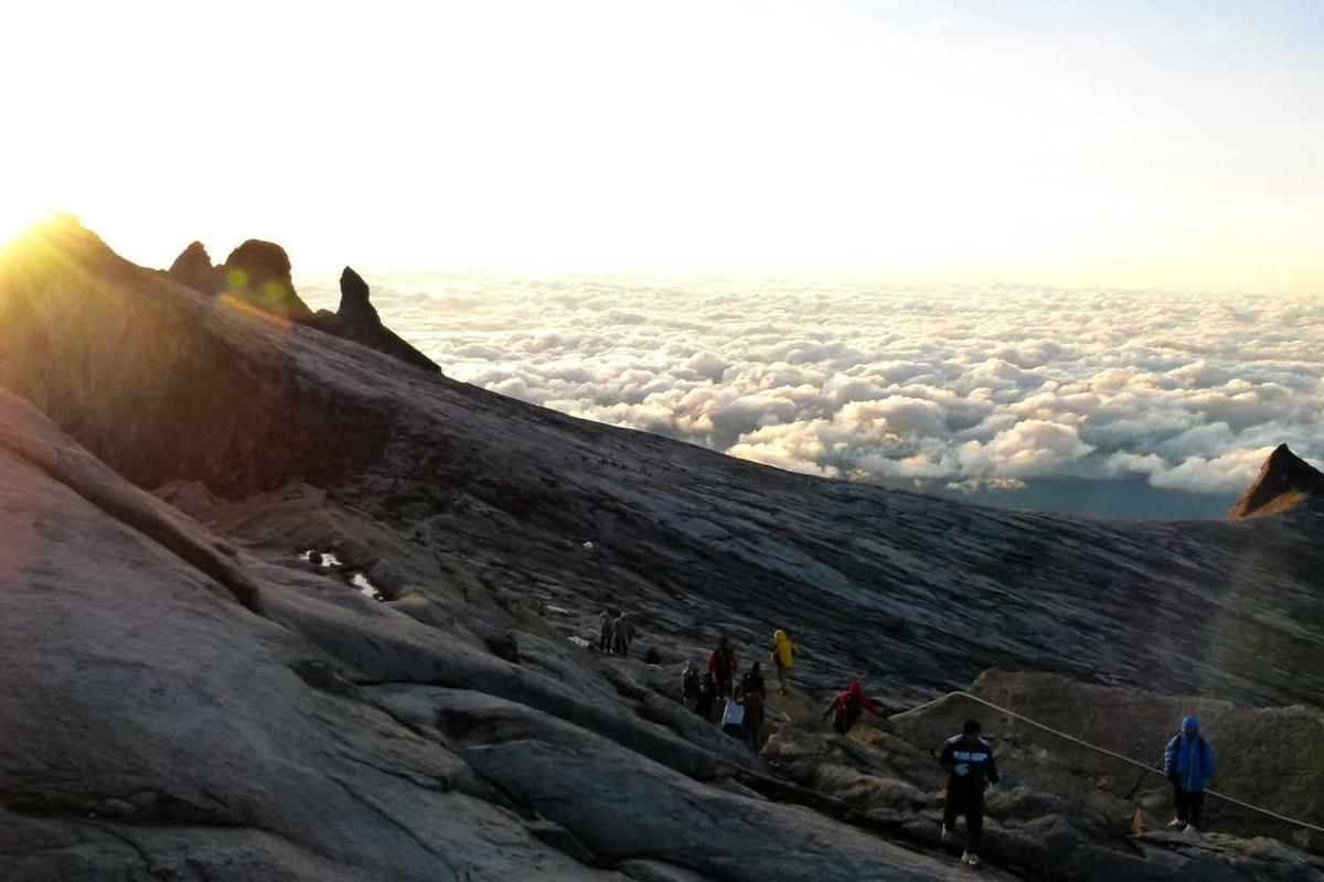 Person working at a foldable ergonomic desk in a Gurgaon office space