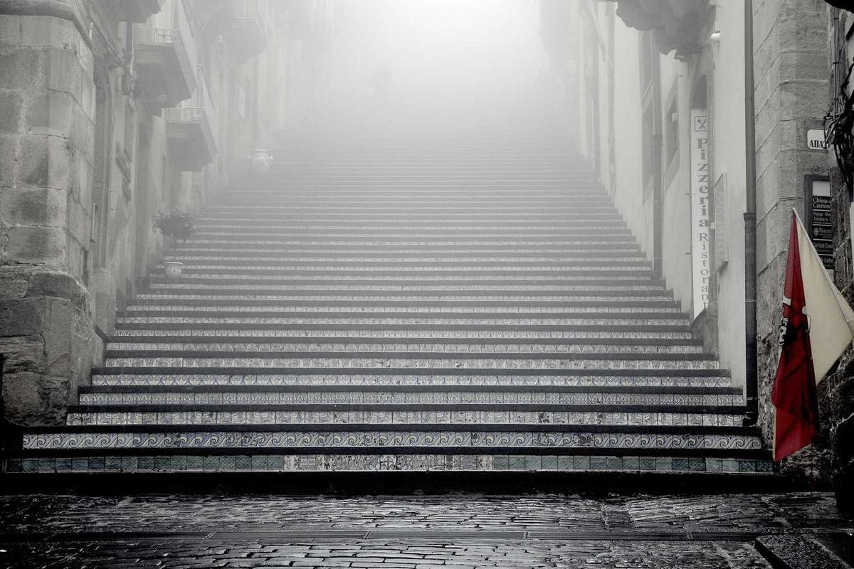 A Comprehensive Guide to Buying the Best Folding Chair in Delhi for Tiny Spaces A person sitting on a compact, folding chair in a small Delhi living room