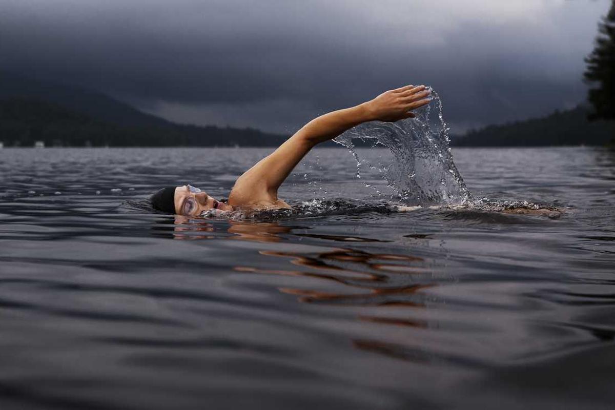 Ergonomic work desk in minimalist office setting with foldable workspace and Noida cityscape view